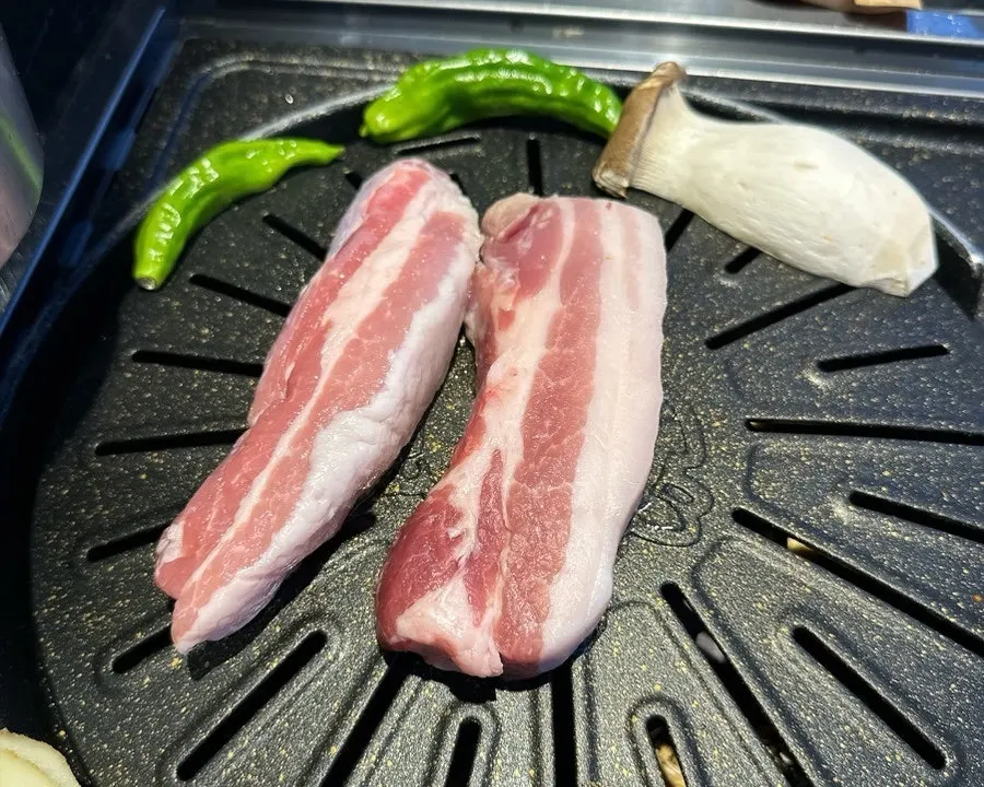 Two servings of Boseong Nokdon pork belly on a plate