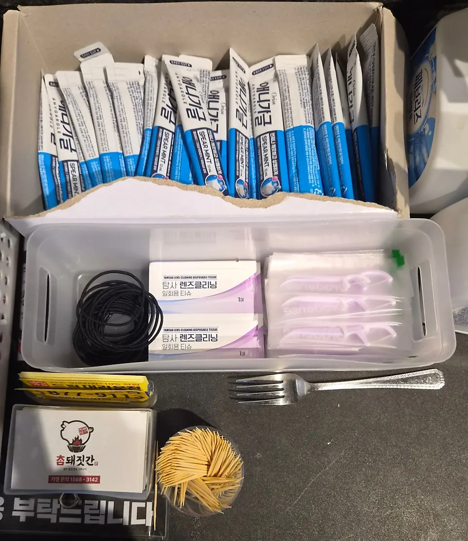 Mouthwash, hair ties and other amenities set out at the restaurant