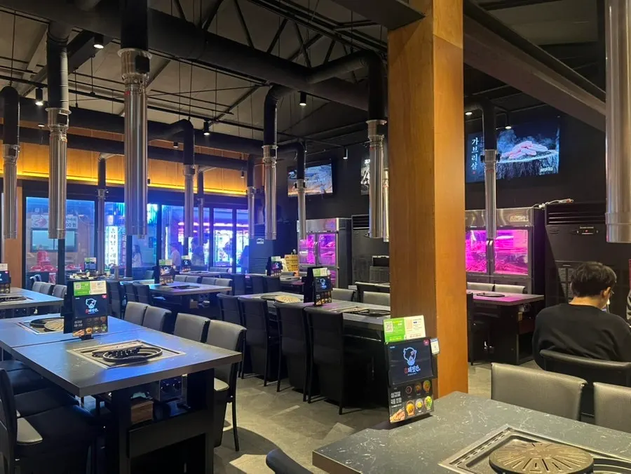 Interior of the restaurant with generously spaced tables