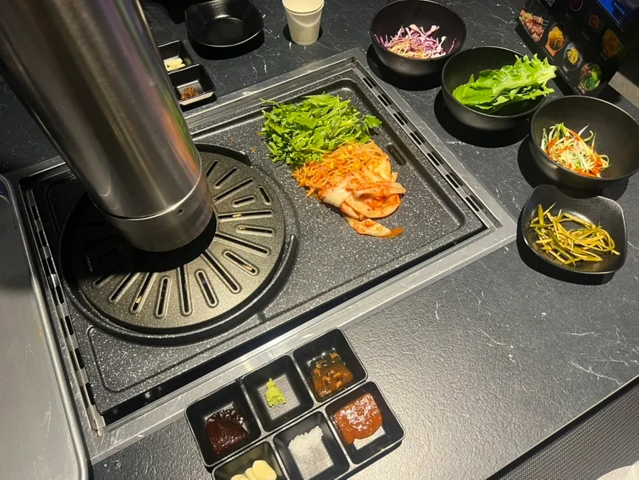 Table set with basic side dishes and sauces