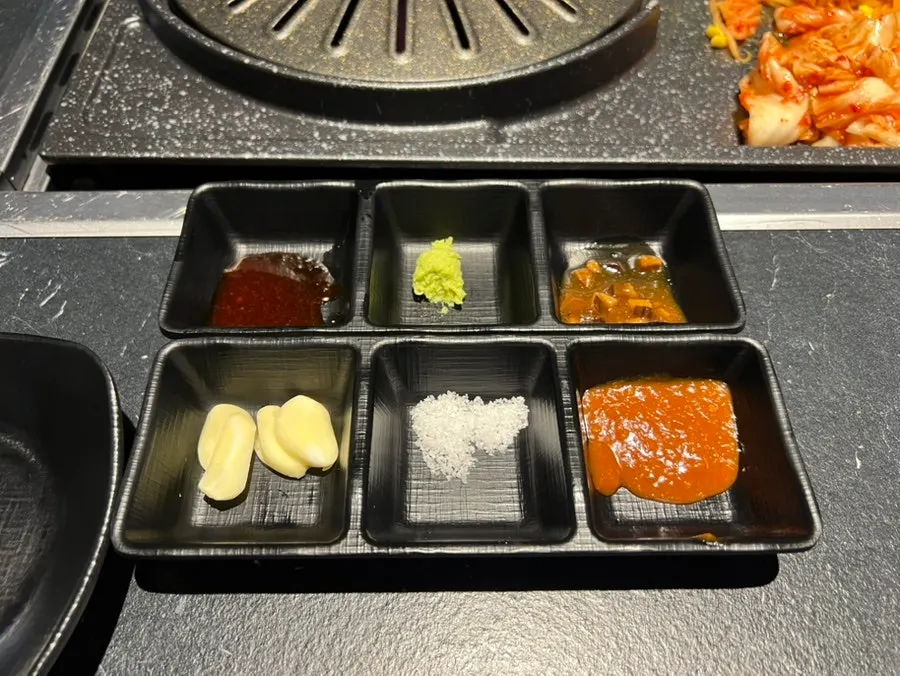 Plate of five sauces including wasabi, salt and ssamjang