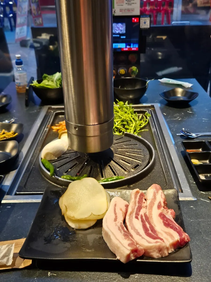 Minari, bean sprouts, and kimchi on the grill