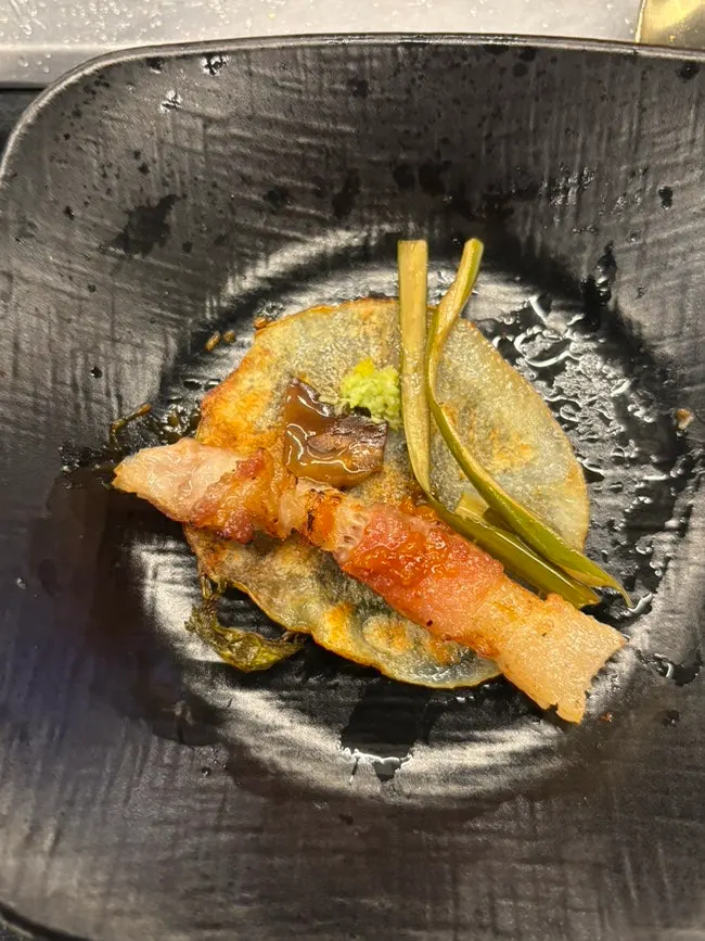 Black pork ogyeopsal dipped in sauce