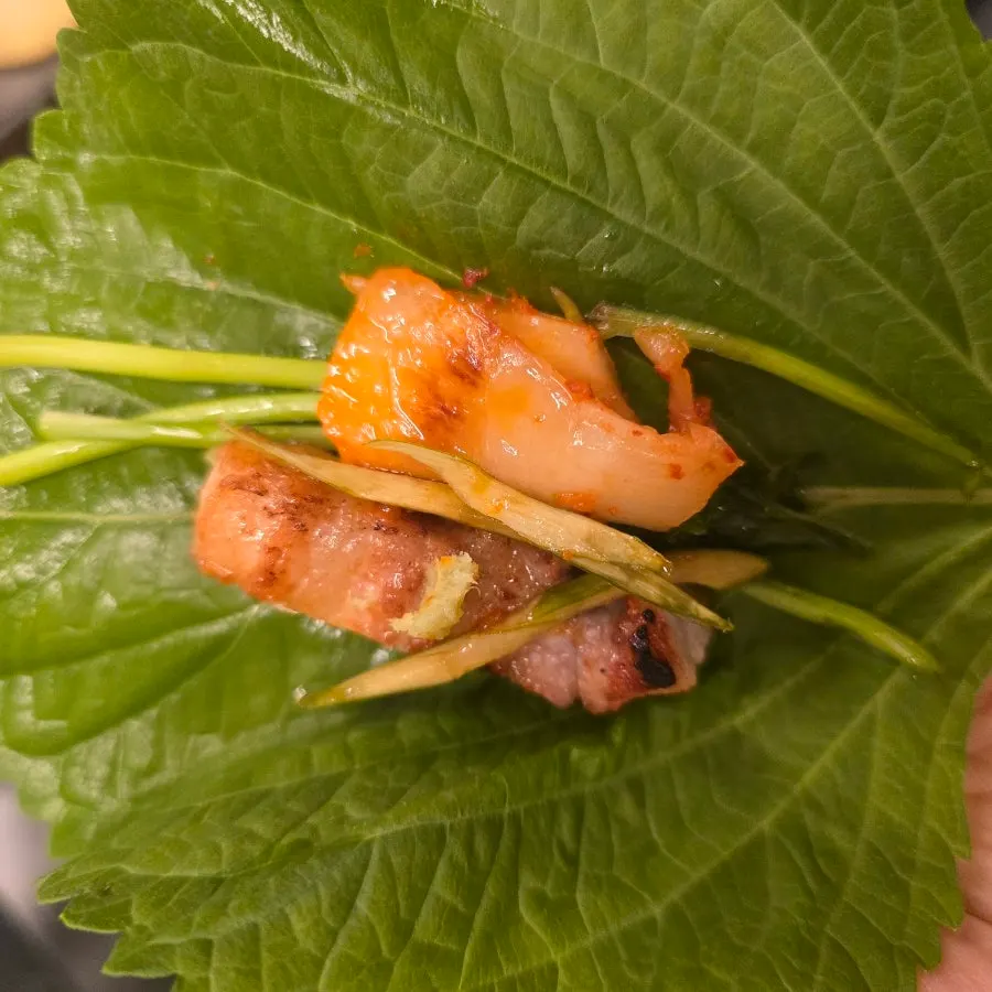 Grilled pork belly cut into bite-sized pieces