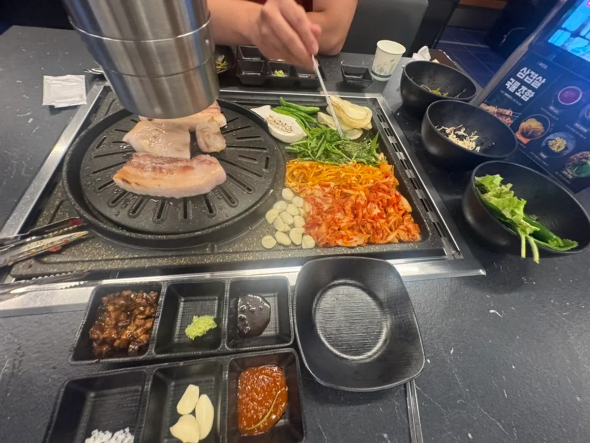 Close-up of grilled pork at Cham Dwaejitgan Cheonan Dujeong Branch