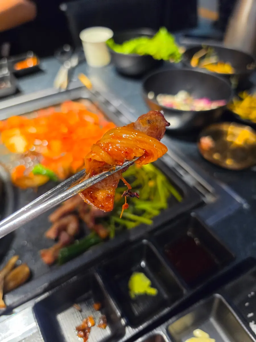 Samgyeopsal eaten with minari stalks