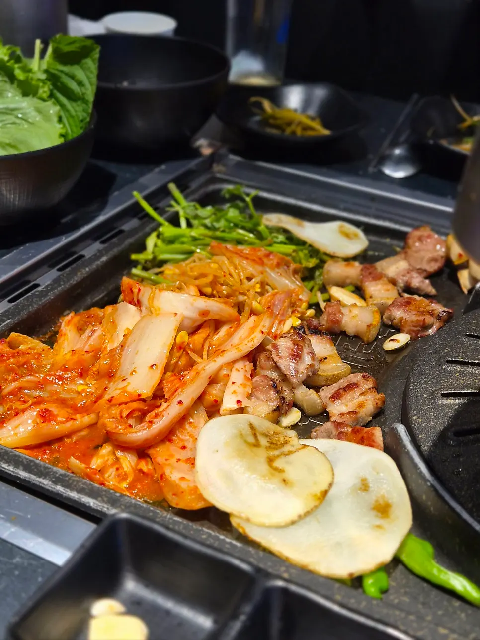 Grilling the additional order of pork neck