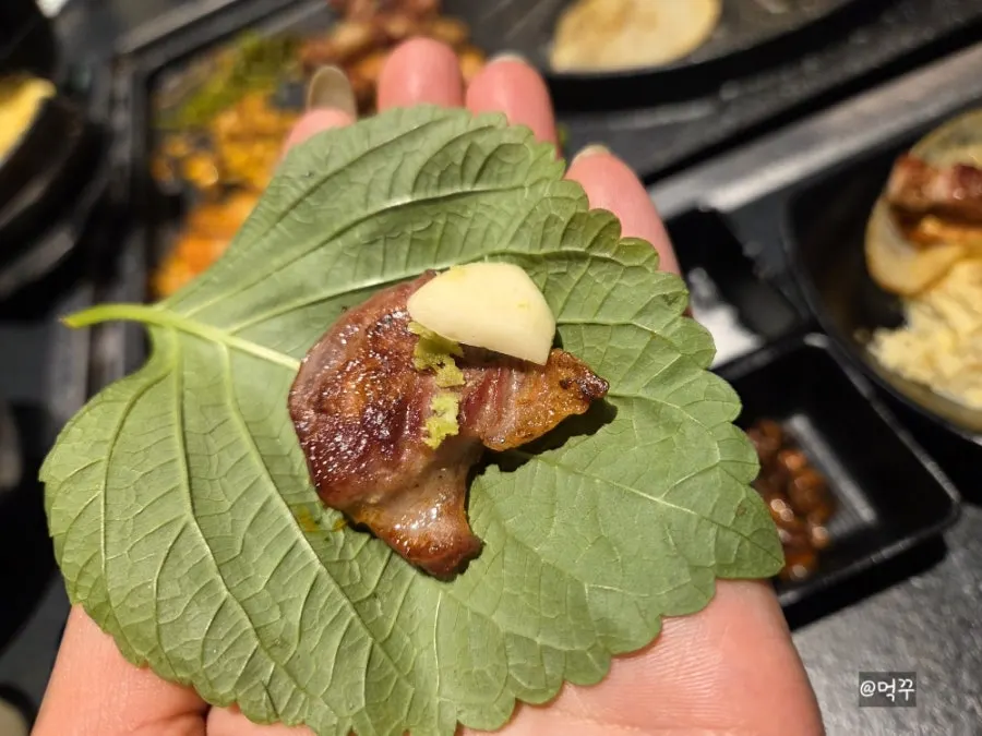 Black pork belly grilled by the staff