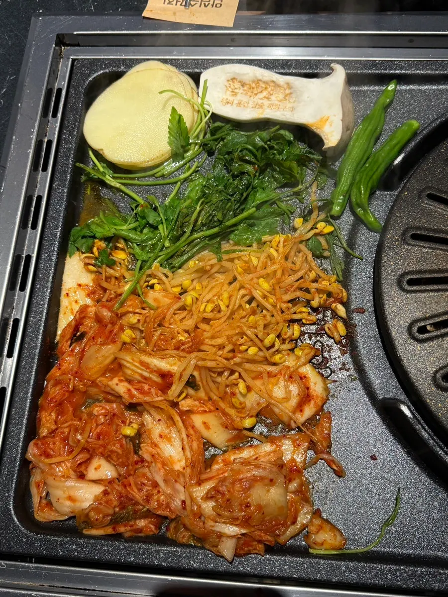 An assortment of pairing sauces including wasabi mushroom and spicy sauce