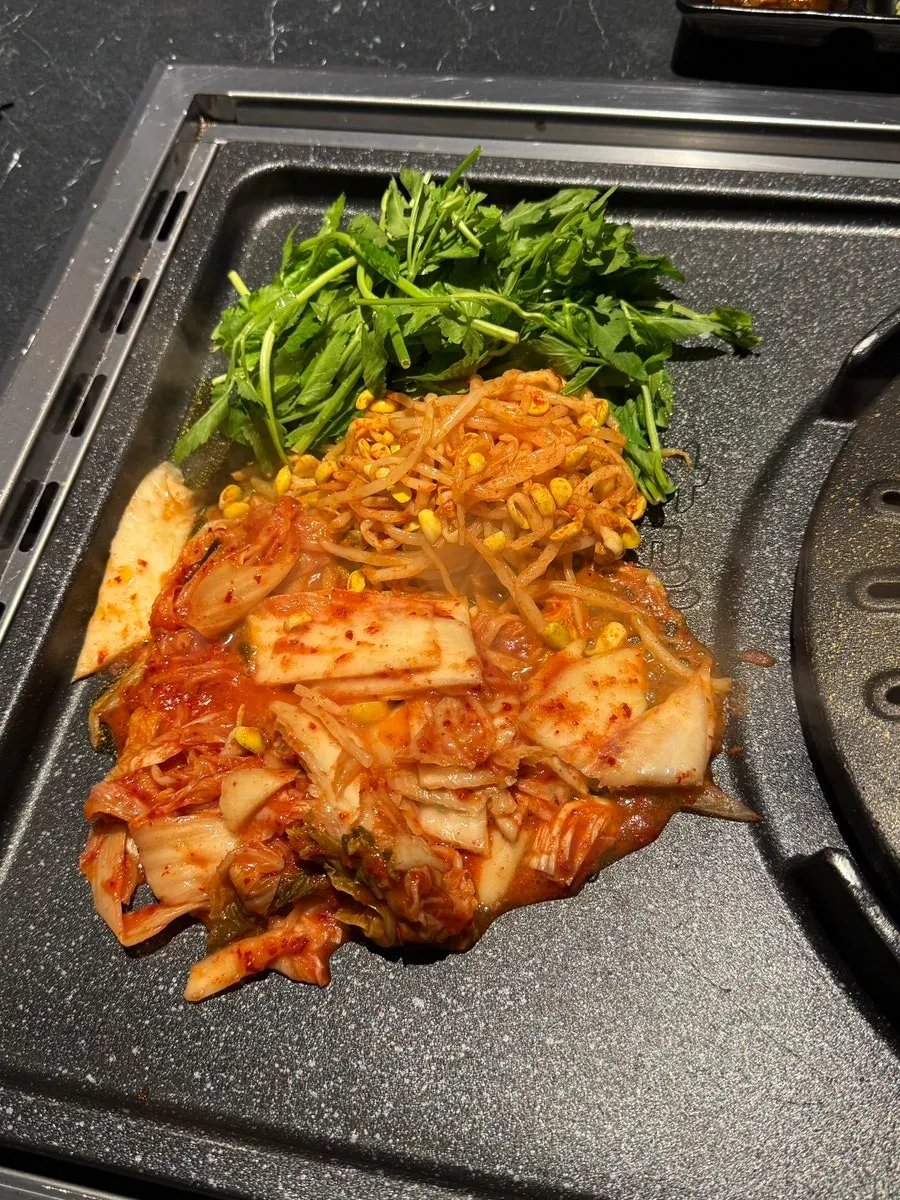 Cham Dwaejitgan's signature sauces on a plate