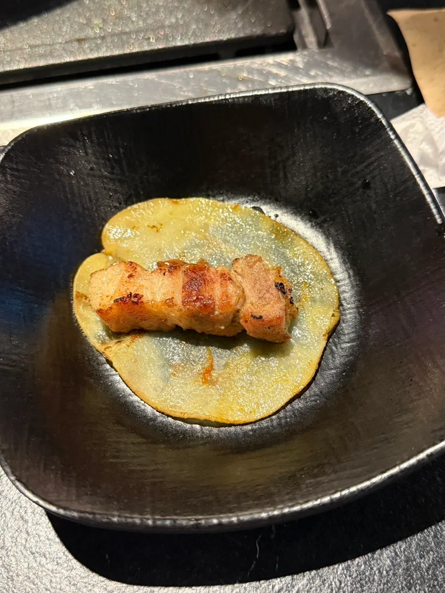 Sliced potato, the signature side item at Cham Dwaejitgan Sinjung-dong Branch