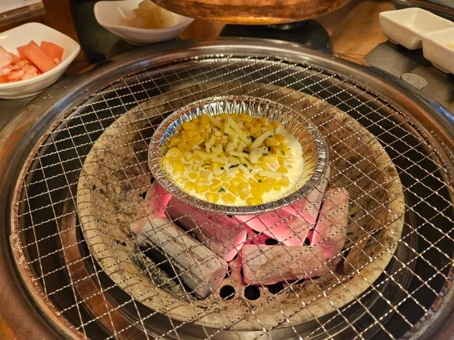 Stone-pot chicken porridge served as a banchan