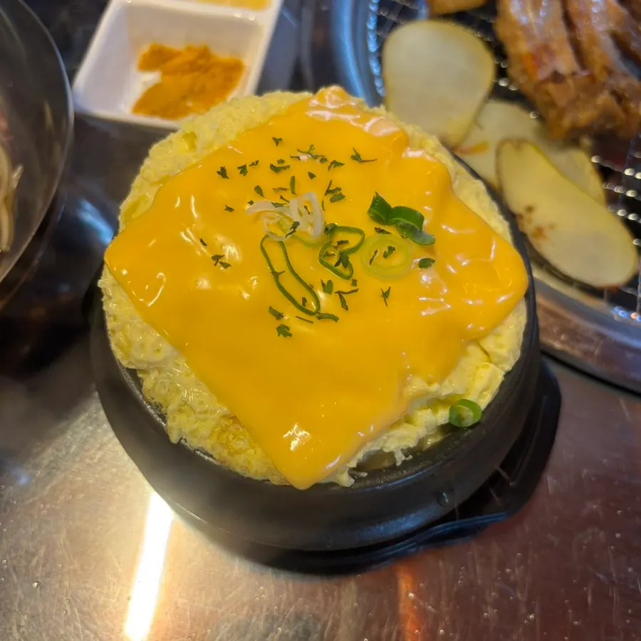 Table spread of 2 servings of soy jjokgalbi and 1 serving of seasoned jjokgalbi