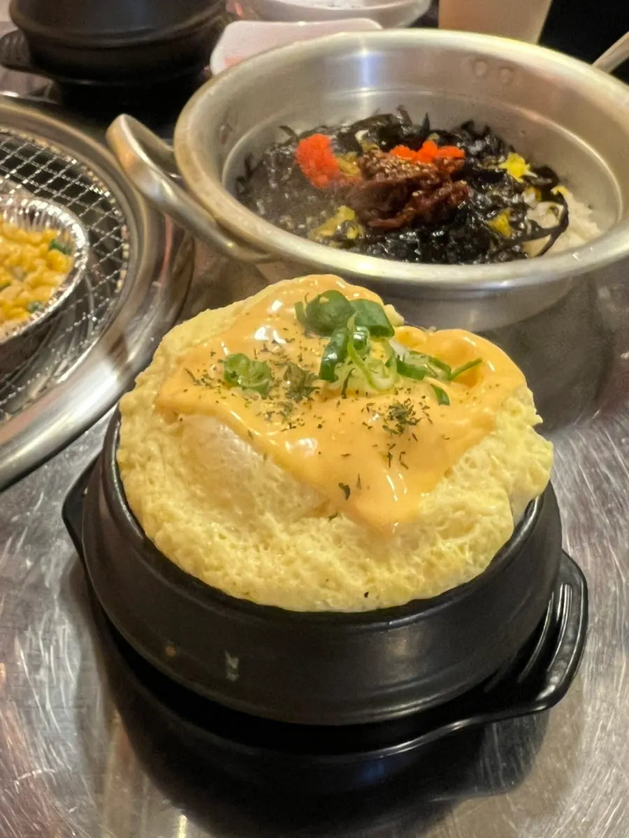 Steamed egg topped with cheddar cheese