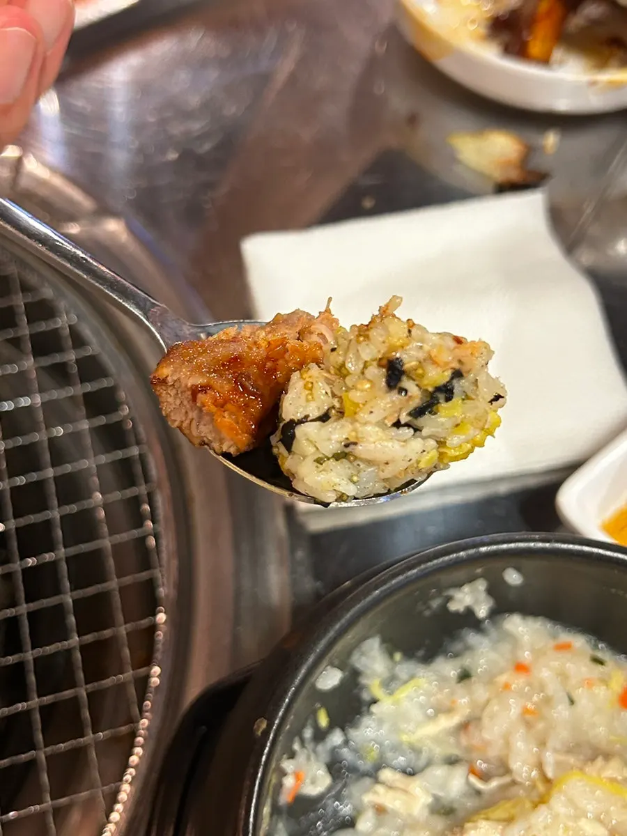 Spicy pork ribs dipped in sauce