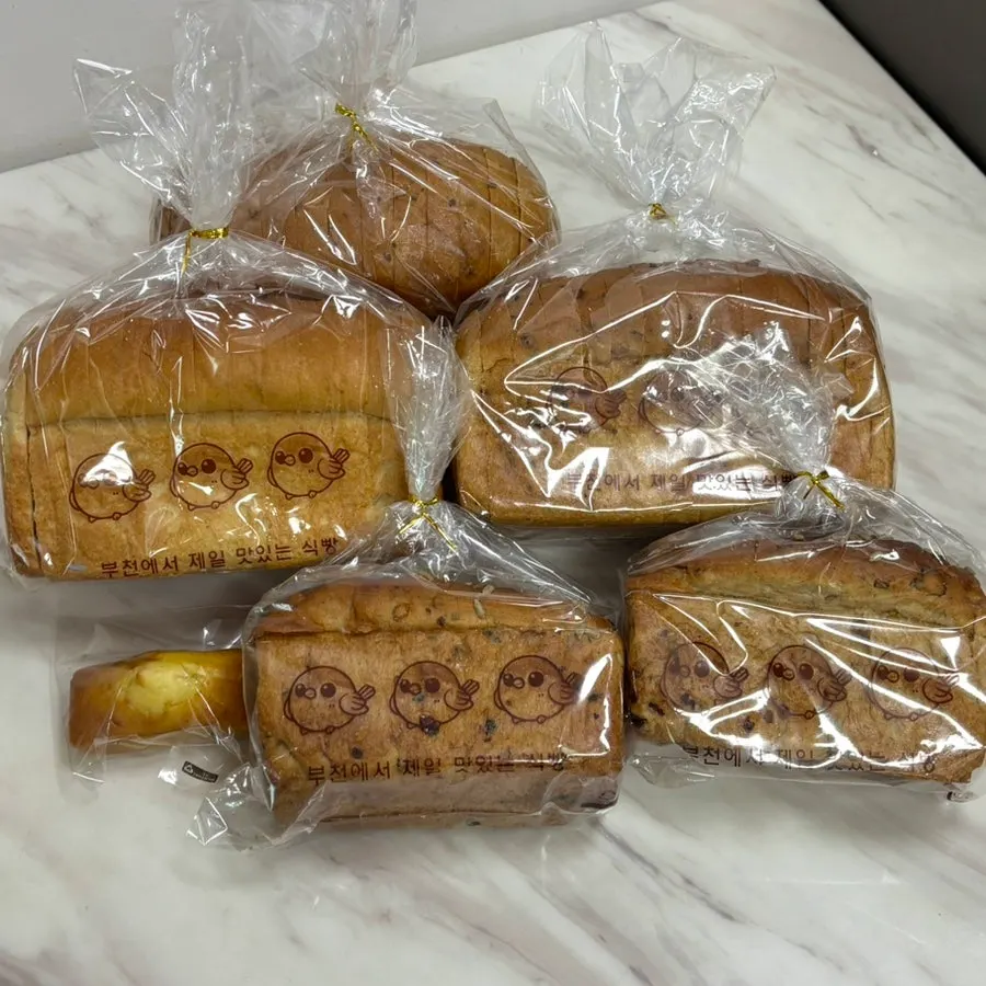 Three barley loaves brought home in their packaging