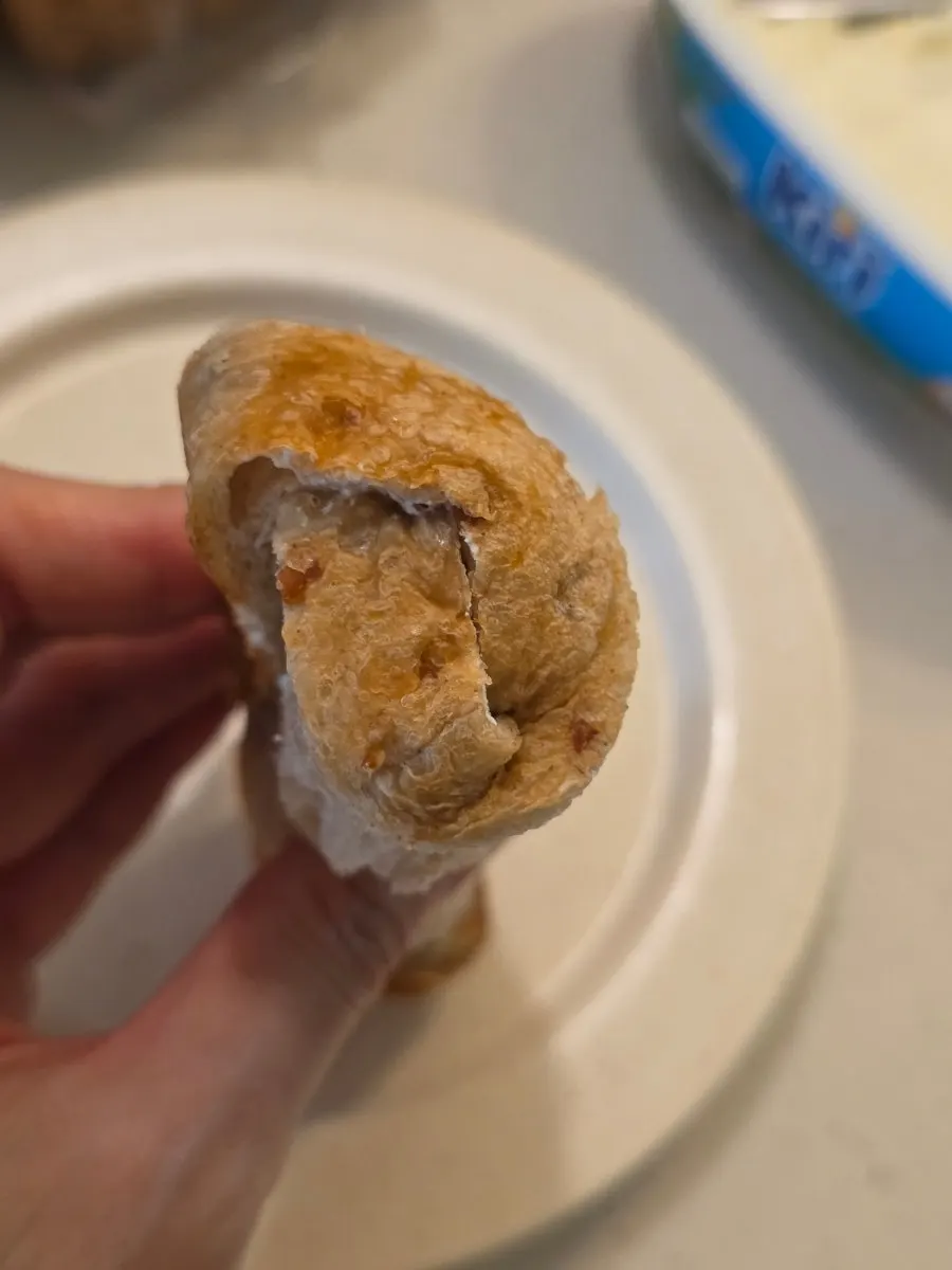 Barley bread rolled up with cream cheese spread