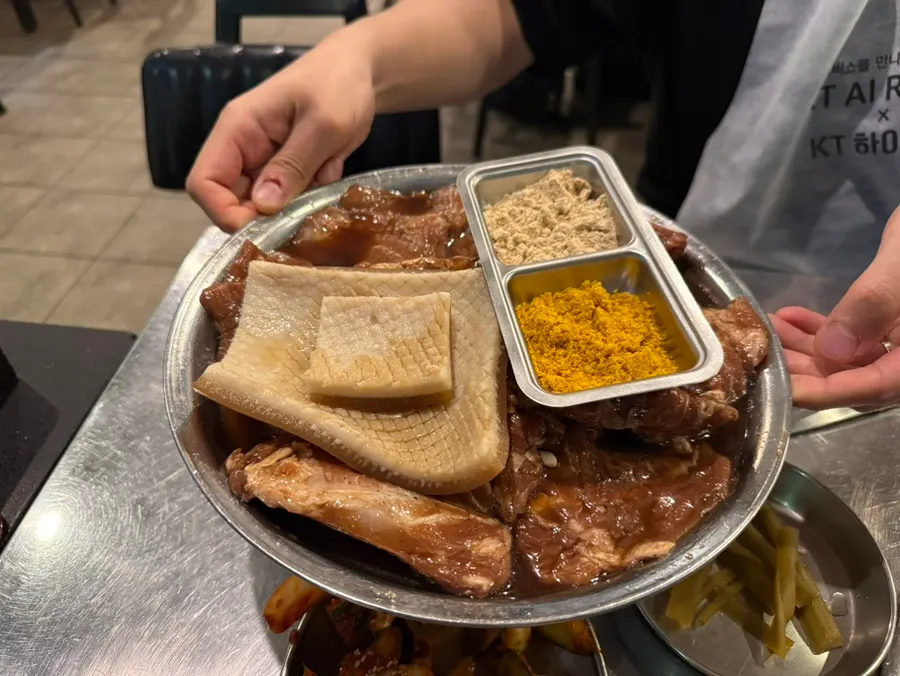 Table set with 2+1 spicy pork ribs and pork skin