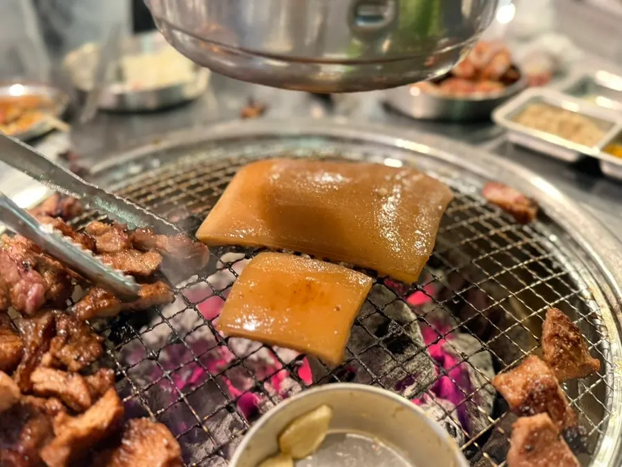 A wrap of spicy pork ribs in perilla leaf