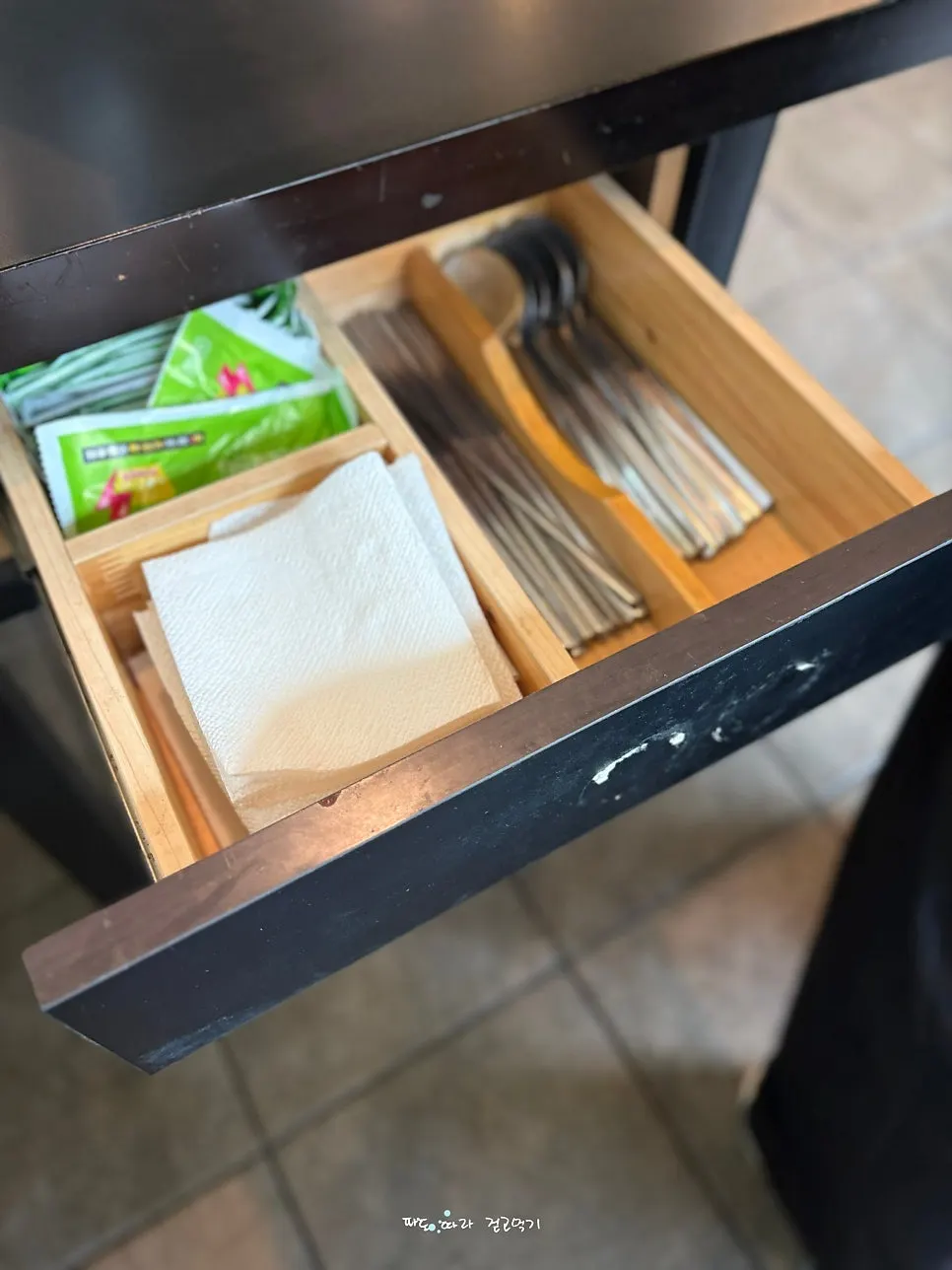 A stocked set of utensils, wet wipes, and tissues