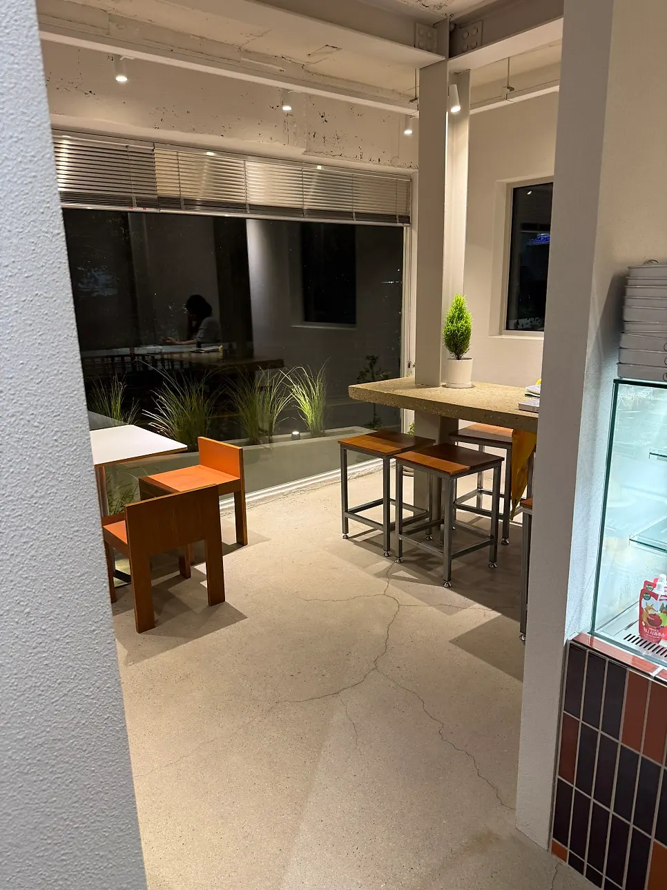 1st floor space with bar seats and standing tables