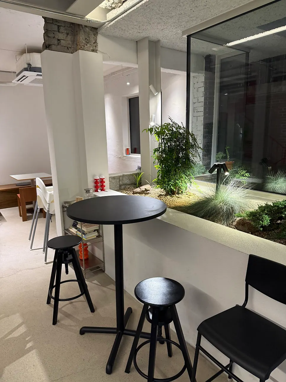 Café seating area furnished with vintage chairs