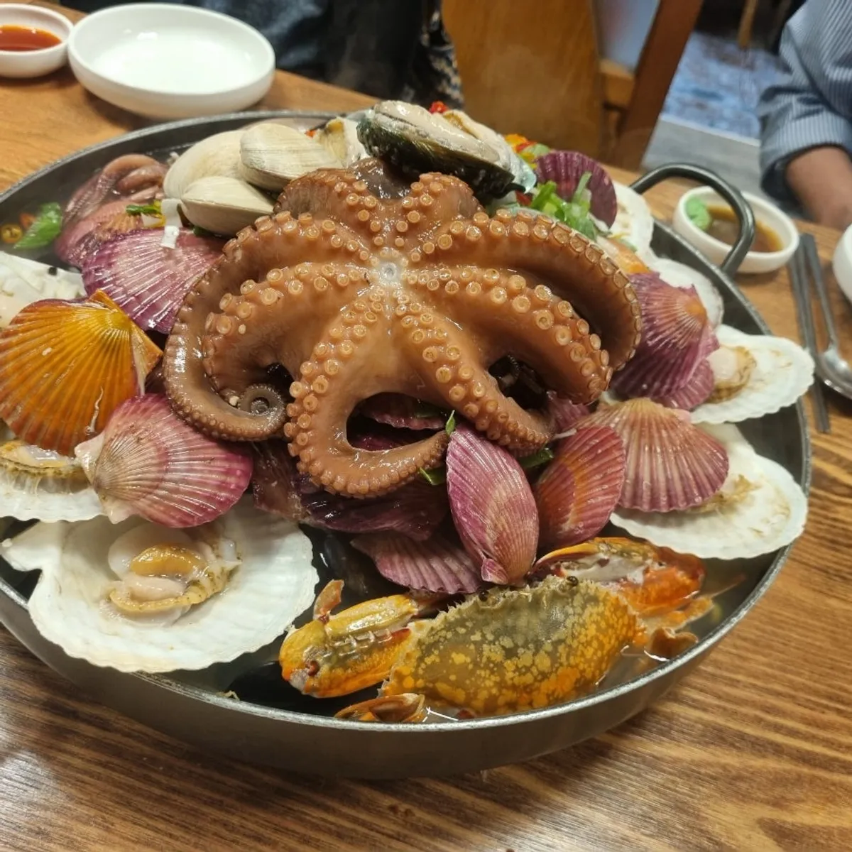 Special Large seafood stew pot piled high with seafood