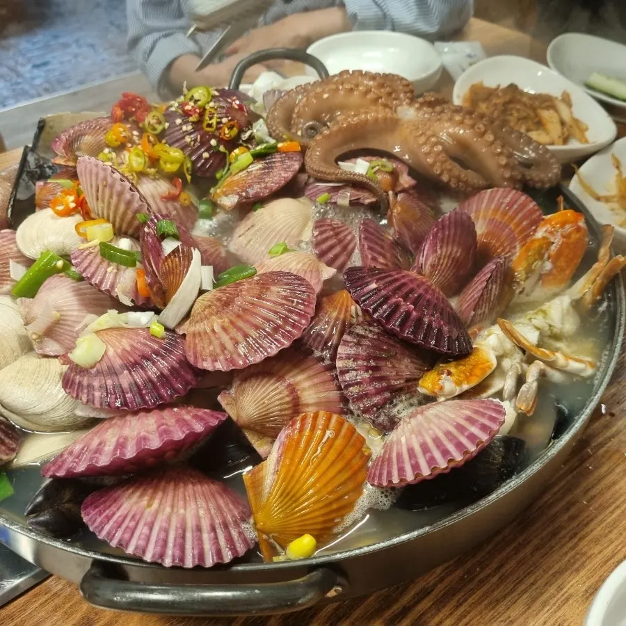 Close-up of the seafood stew starting to boil