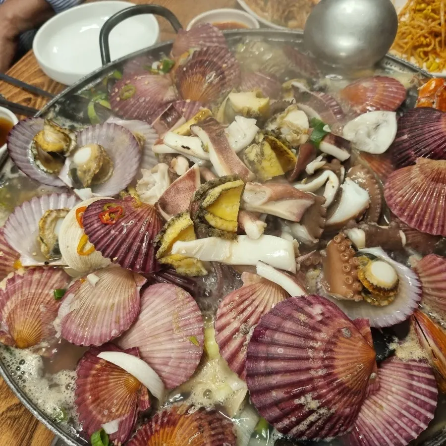 Abalone and scallop meat separated from their shells