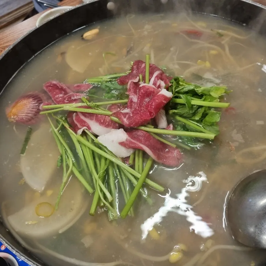 Rich broth remaining after the seafood was eaten