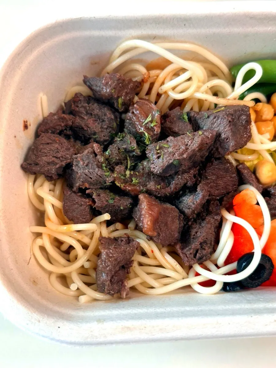 Protein box with fresh vegetables and steak