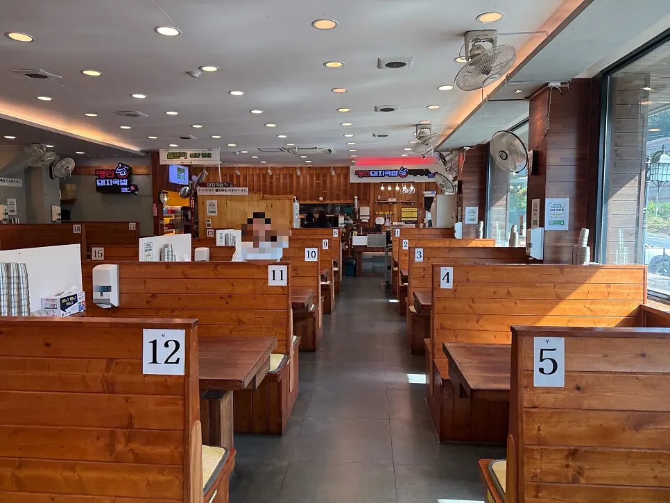 Exterior of Myeongin Dwaeji Gukbap with a classic gukbap-restaurant feel