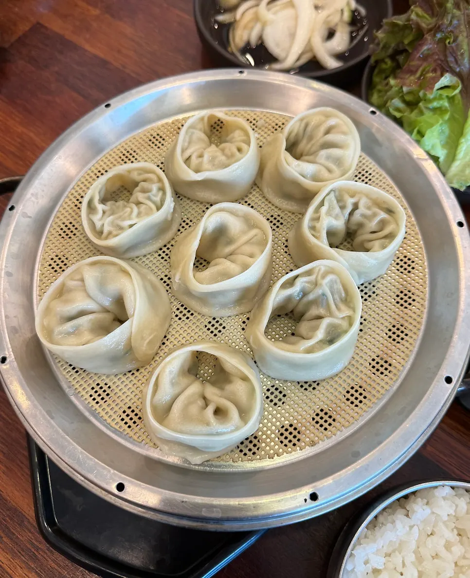 Plate of dumplings served alongside the gukbap