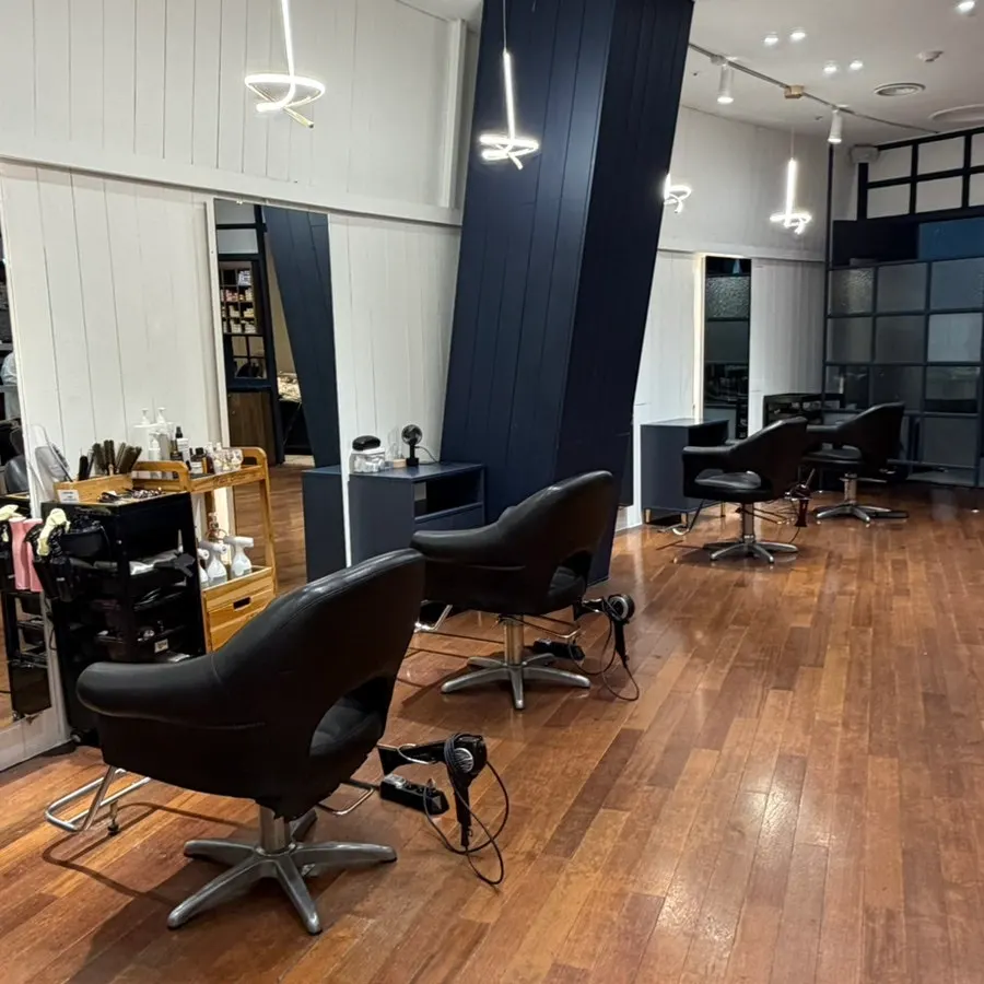 Interior of the salon stretching wide on both sides