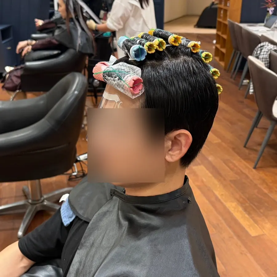 Perm rollers set on the top of the head