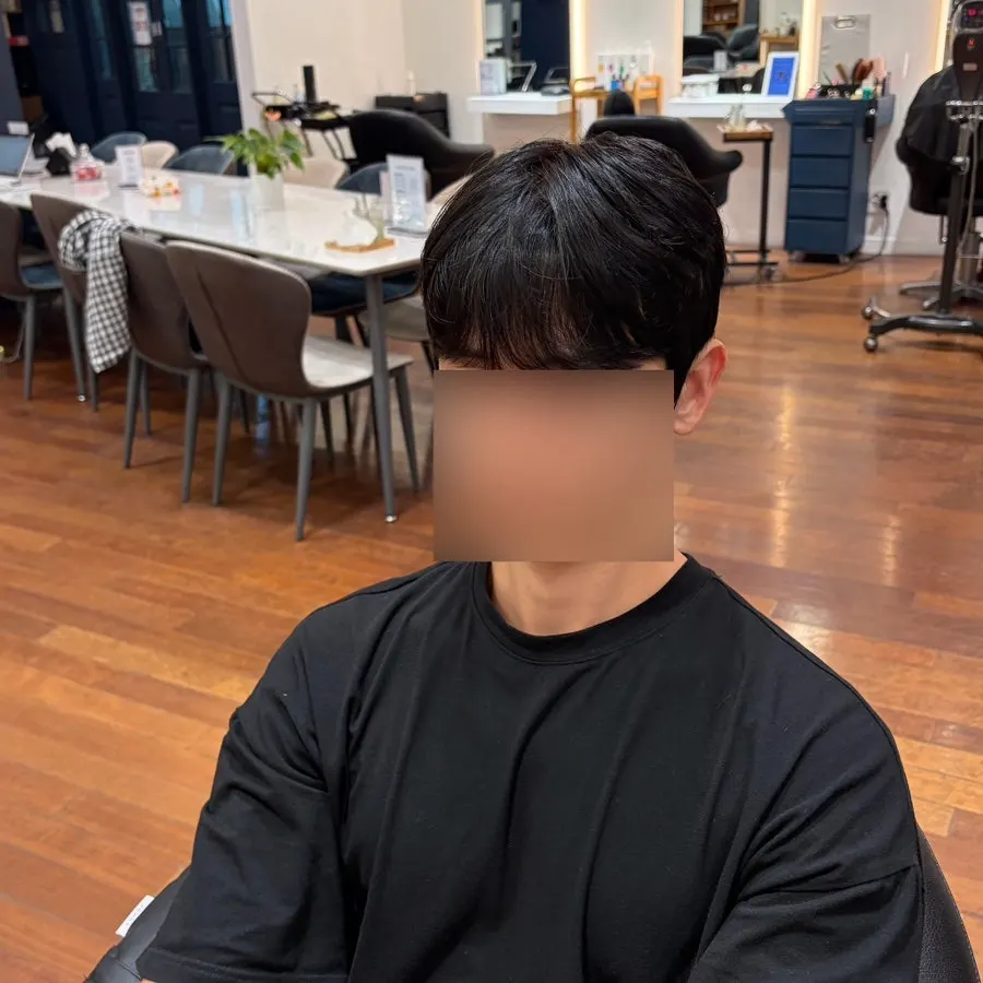 Men's hair styled with a see-through look