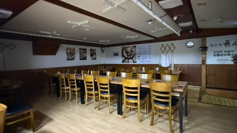 Spacious hall seating suitable for group gatherings