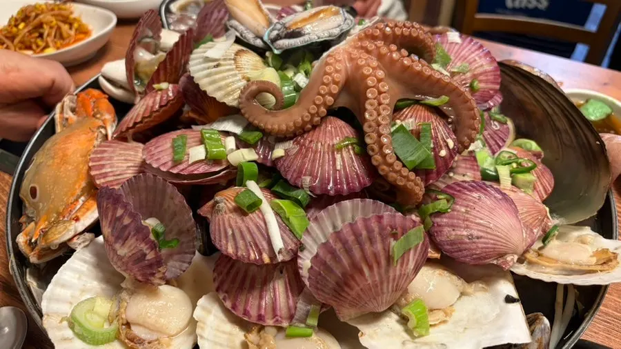Seafood platter set out before being placed on the grill