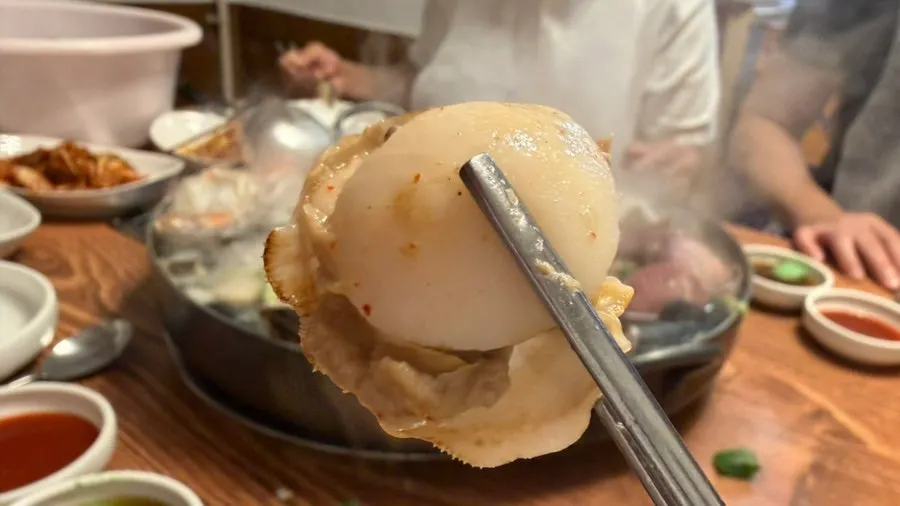 A steaming piece of clam
