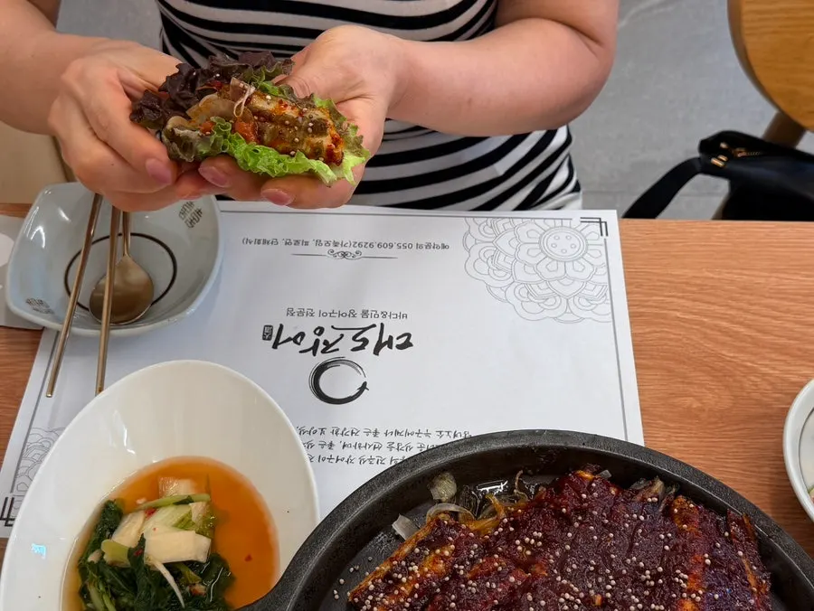 Lunch table with grilled eel and side dishes together