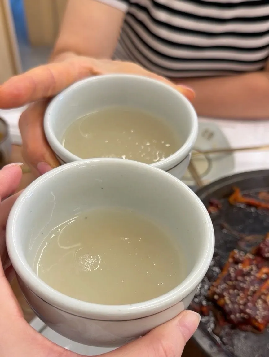 Sweet rice punch (sikhye) served as dessert after the meal