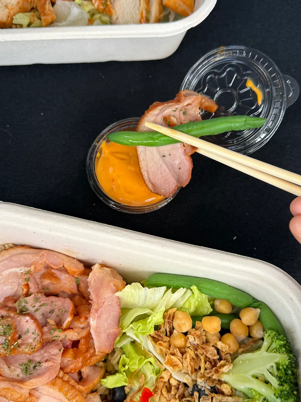 Eating the Changwon salad meal at the park