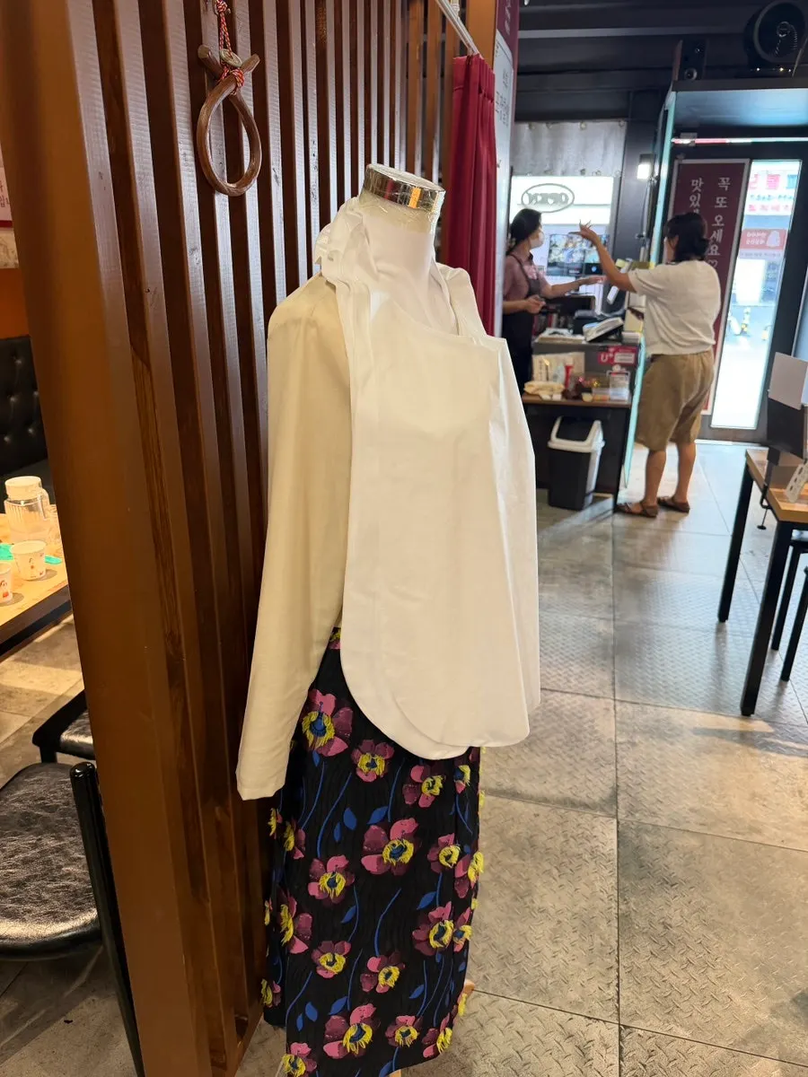 Coat hooks next to the tables