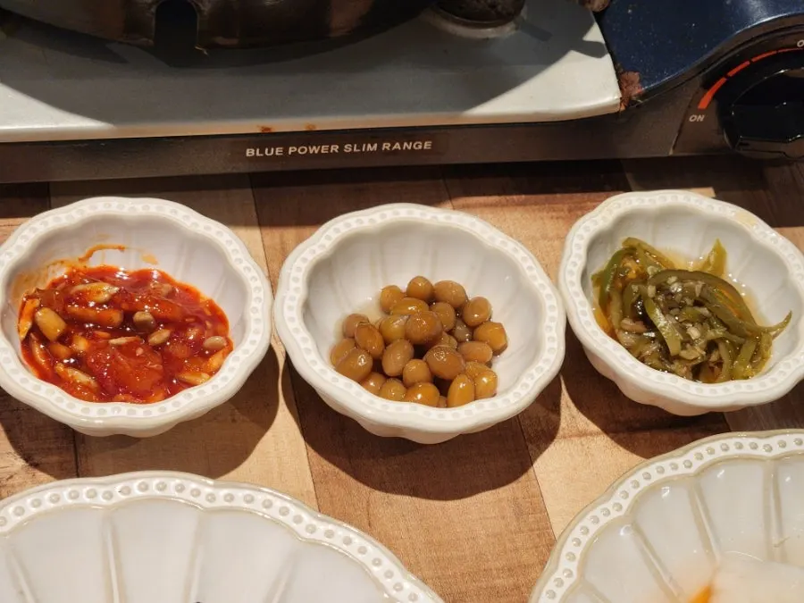 Salted seafood, soft braised soybeans, and pickled pepper