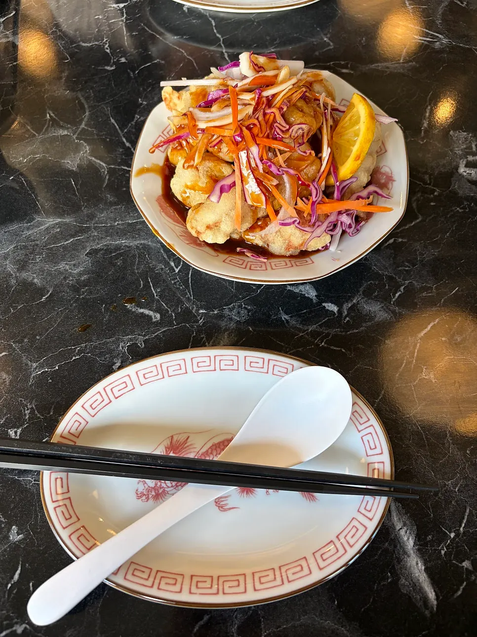 Freshly fried tangsuyuk served with sauce on the side
