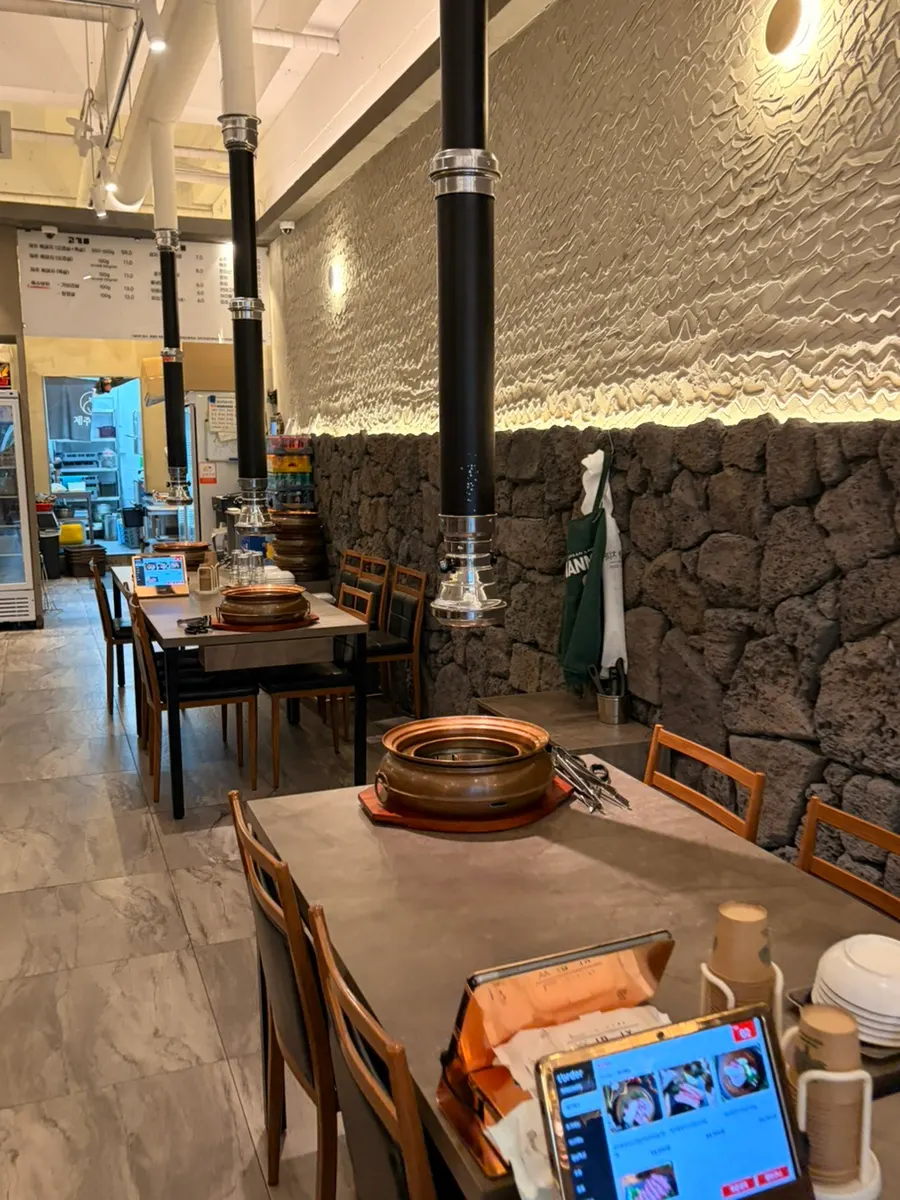 Bright, clean restaurant interior with a Jeju atmosphere