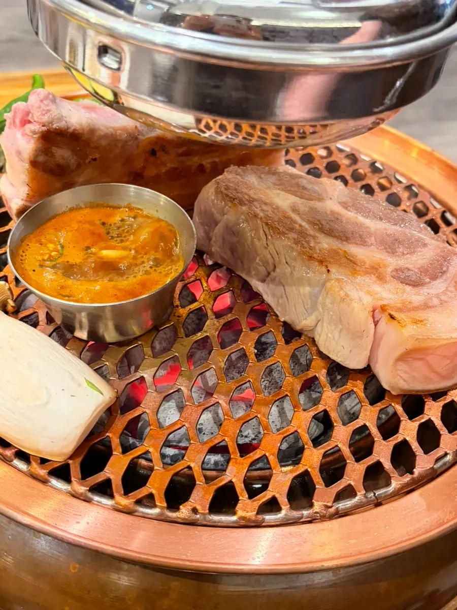 Thick black pork grilling