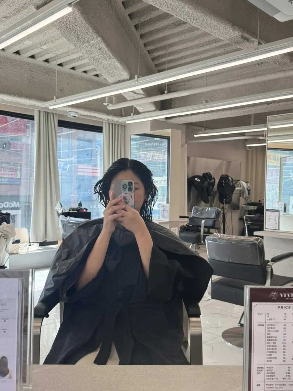 Wet hair being checked for damage level after shampooing