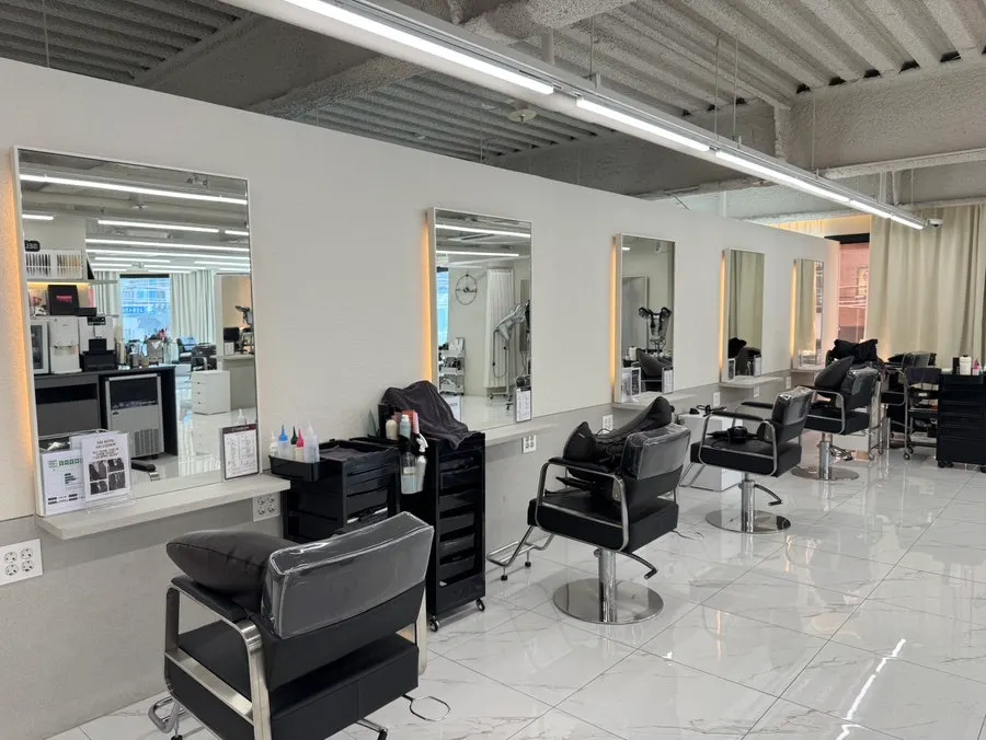 Inside the salon during the layered perm treatment