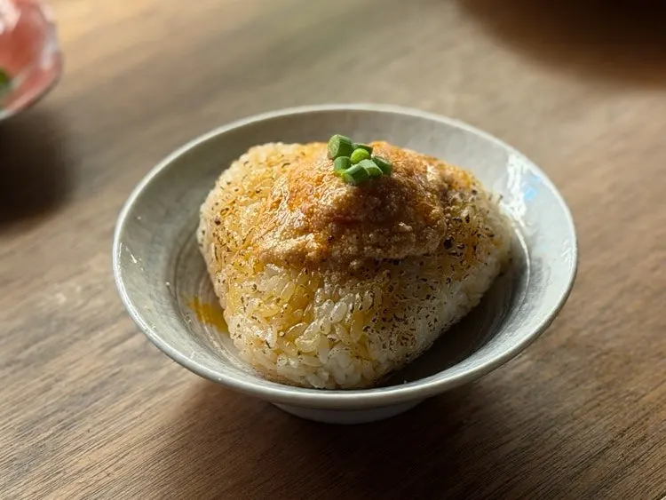 Mentaiko onigiri lightly torched on top